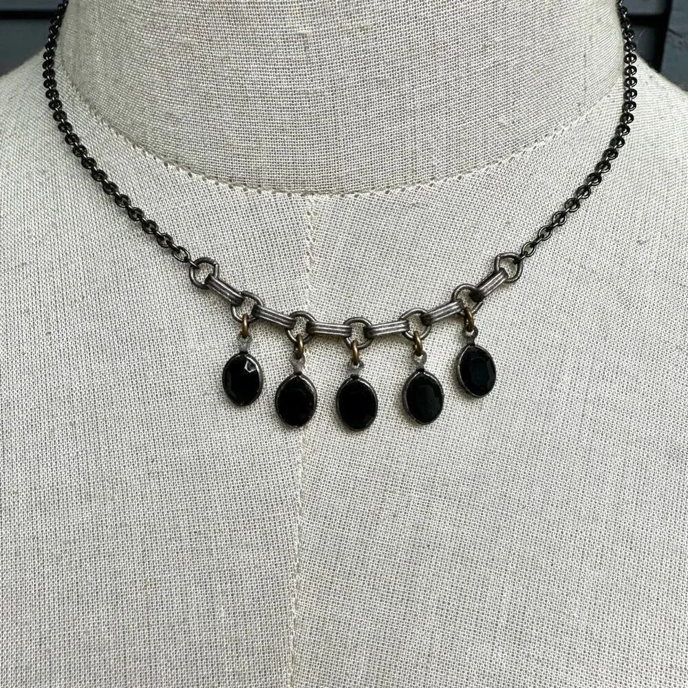 Black and grey ovalโbeaded necklace